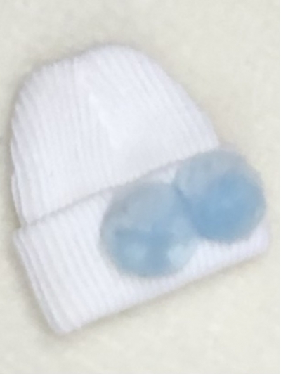 newborn knitted hat blue pom poms