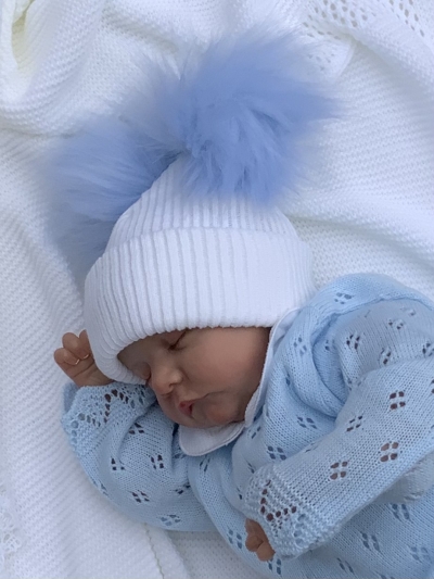 babies white knitted blue pom pom hat