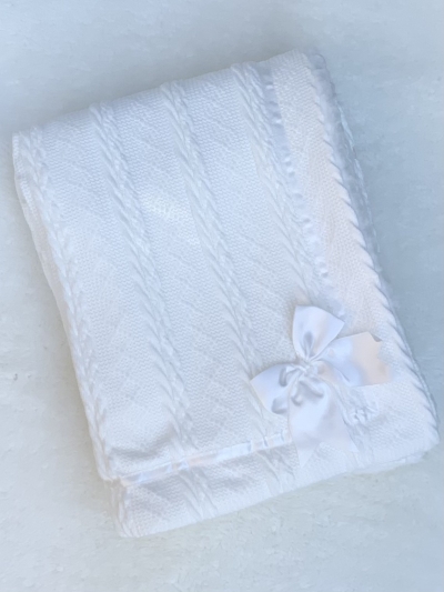 babies white cable knitted shawl blanket bow